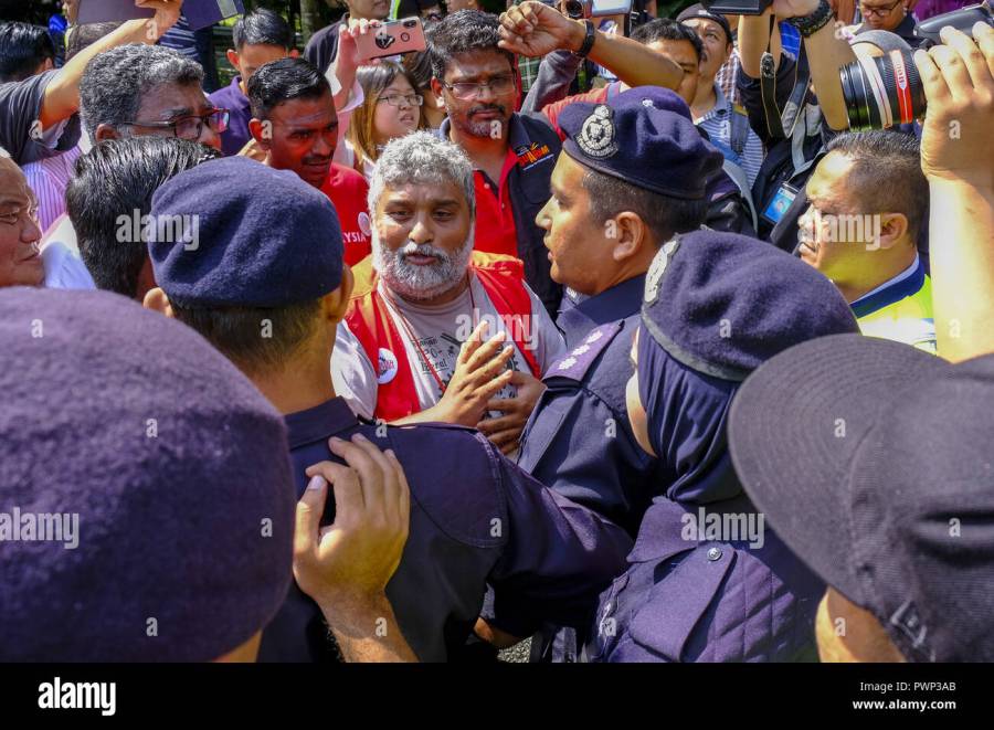 kuala-lumpur-malaysia-17th-oct-2018-parti-sosialis-malaysia-psm-candidates-arul-chelvam-seen-at-bantah1050-rally-to-protest-against-the-minimum-wage-of-the-malaysian-worker-at-merbok-fieldhundreds-of-malaysian-stud.jpg